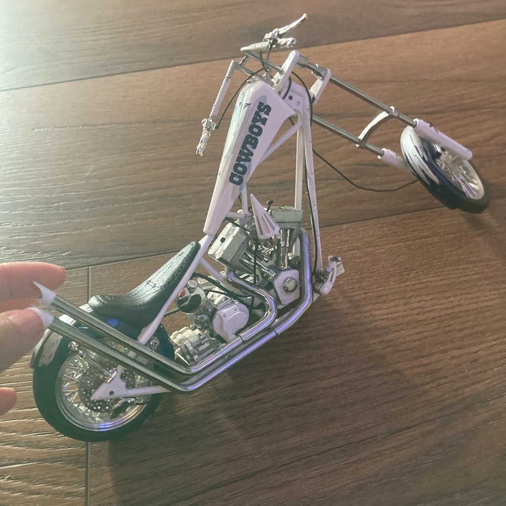 Source Unknown White and Black 'Cowboys' Chopper Model Motorcycle
